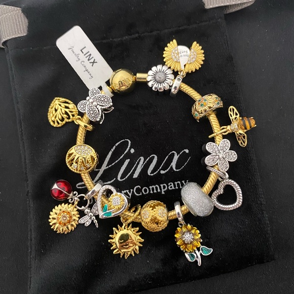 Linx Yellow Gold Bracelet with Sunflower Themed Charms